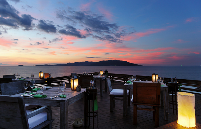 Book a table on one of the nine cantilevered verandahs of weathered teak and bamboo.