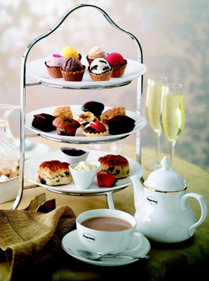 High tea with scones and cream, cupcakes and more