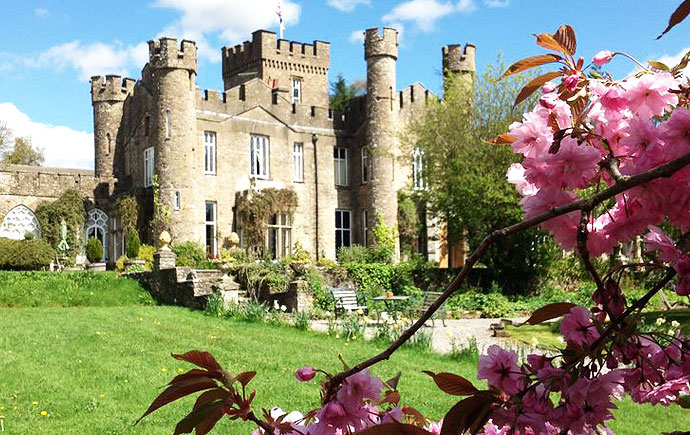 SUMMER WEDDING VENUE | Augill Castle exteriors through the cherry blossoms