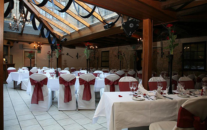 FOR A SIT-DOWN WEDDING | Banquet seating for a sun-lit ceremony at Walworth Castle