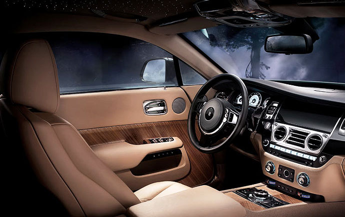 The eye is immediately drawn to an elegant sweep of tactile wood that exquisitely furnishes the car’s lower hull