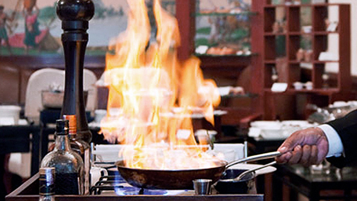 RETRO REVIVAL | The art of flambé is a vintage culinary technique and is practiced with élan at Nostalgia, making the food a sight to feast on