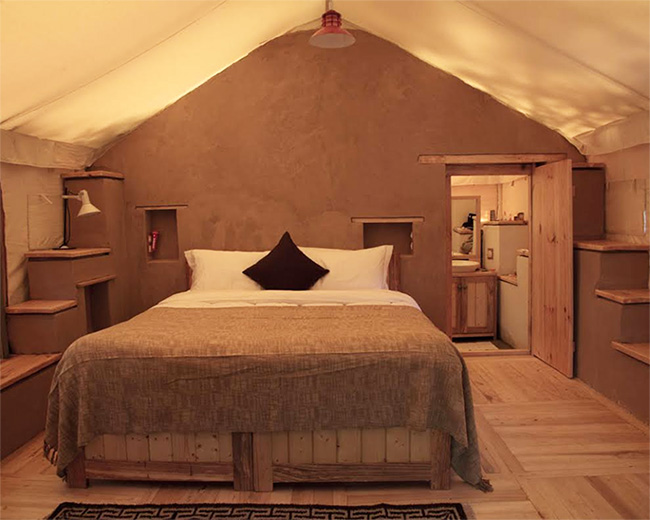 HAUTE HERITAGE | The five lavish tents scattered across the orchard have reading rooms and bedrooms with attached bathrooms