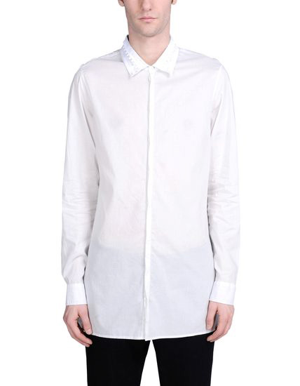 ANN DEMEULEMEESTER | Taking a casual but more structured route will be this plain woven long white shirt with collar detailing from the namesake brand