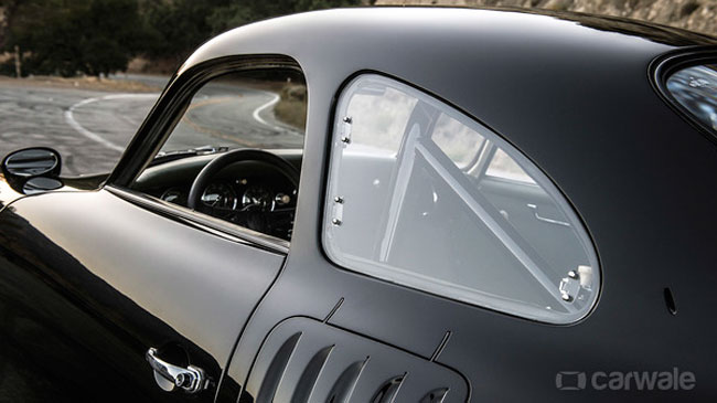 ROAD SHARK | Gills on the side of the Special facilitate cooling of the rear-mounted engine—not to mention the clean-mean prowler-of-the-streets look