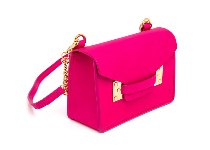 LUXE SATCHELS | Adding a pop of pink to your days will be Sophie Hulme’s Milner cross-body, a non-buckles, strapless variation of the boxy satchel