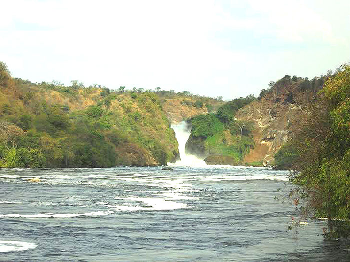 UGANDAS MURCHISONS FALLS NATIONAL PARK | Uganda's largest national park is a conserved habitat with its untamed wilderness and savannahs, cut through the middle by the majestic river Nile