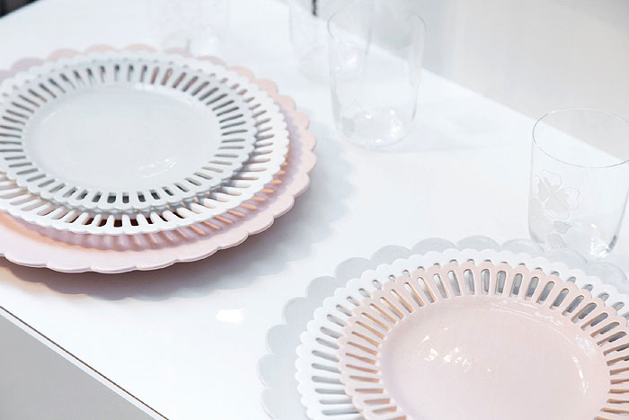 India Mahdavi | Dior Home plates. Each plate set includes three plates in three different colors: pink, white, and gray