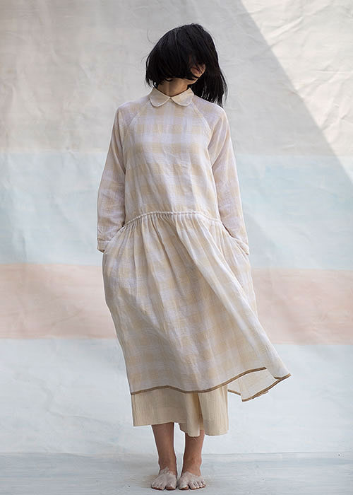 MURAKAMI DREAMS | Match this Runaway Bicycle layered hem dress in egg shell white, with subtle checks all over, to dress up or down as per your mood