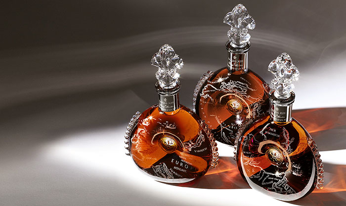 ETCHED WITH HISTORY | A sublime crystal decanter, cut and wheel-engraved by hand at the royal cristallerie, SAINT-LOUIS, is etched with a 19th-century map of the continent where it is bound