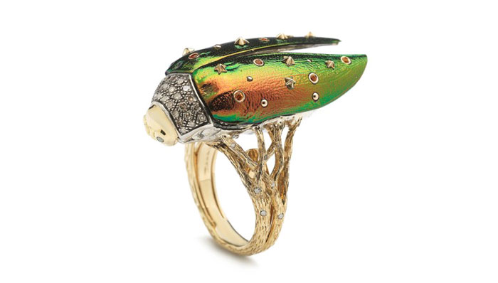 18-karat-gold scarab ring with preserved scarab beetle wings along with brown and white diamonds, priced $5,750