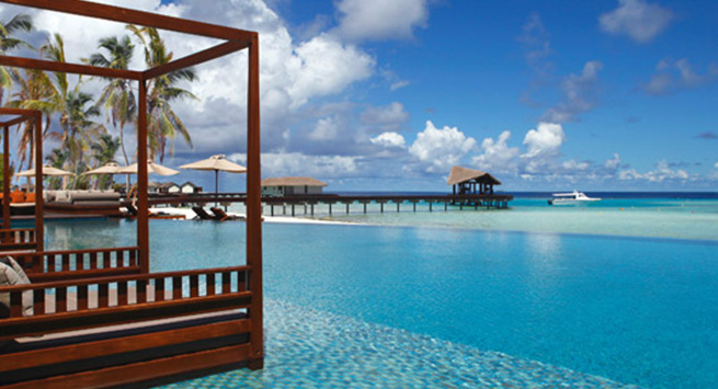 Submerged daybeds in the pool to just blow away your cares