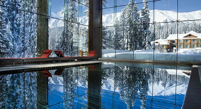 This pool brings the outsides in so fully, you’d feel you were swimming in a Himalayan lake