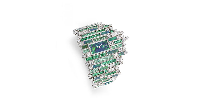 Verde Bisazza watch takes the shape of waves rippling at the shore with a mosaic of emeralds, diamonds and green tourmalines