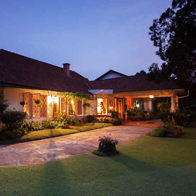 FRESH START | Few things in life can mimic that feeling of waking up amidst lush greens and walking on a thick carpet of dew kissed grass. Photograph: The School Estate, Coorg