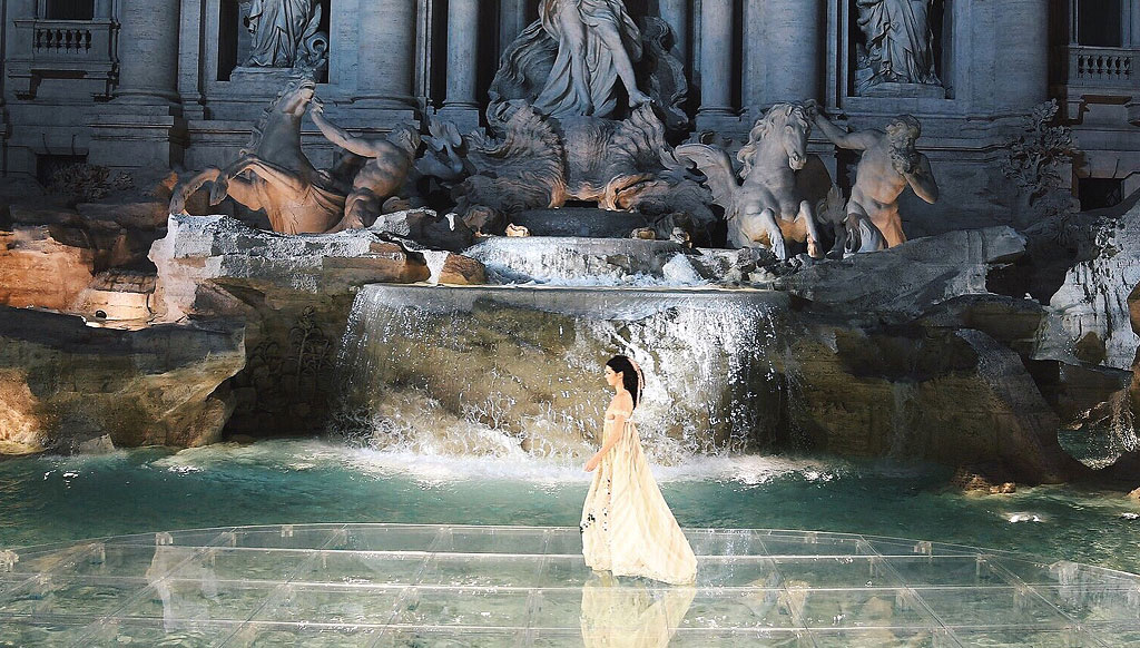 Models walk on water at Fendi’s Fairytale Trevi show