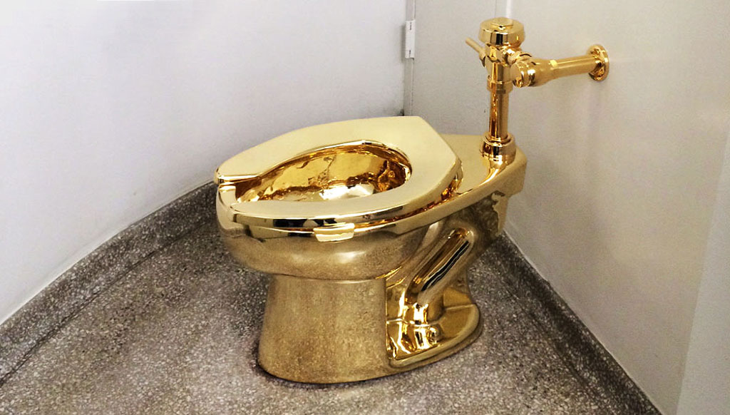 A sold-gold toilet seat titled ‘America’